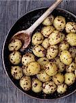 close up of rustic boiled potato in mustard