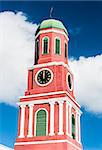 Famous red clock tower on the main guardhouse at the Garrison Savannah. UNESCO garrison historic area Bridgetown, Barbados