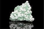 Sample of a beautiful  Prehnite  gemstone speciment isolated on black background