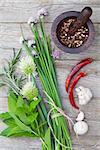 Fresh herbs and spices on garden table. Top view