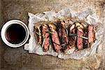 close up of rustic cut juicy barbecue grilled steak