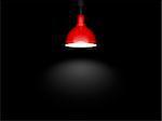 An image of a red lamp in front of a black background