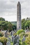 The Old Cemetery. The round tower that stands in St. Kevin's Graveyard in Glendalough, County Wicklow, Ireland.