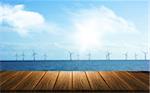 3D render of a wooden table looking out to a wind farm in the sea