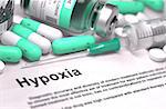 Hypoxia - Printed Diagnosis with Mint Green Pills, Injections and Syringe. Medical Concept with Selective Focus.