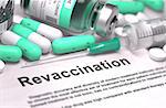 Revaccination - Printed with Mint Green Pills, Injections and Syringe. Medical Concept with Selective Focus.