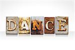 The word "DANCE" written in rusty metal letterpress type isolated on a white background.