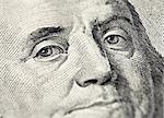 Macro of Benjamin Franklin's face on the US 100 dollar bill