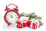 Christmas clock, gift boxes and snow fir tree. Isolated on white background
