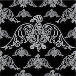 Eagle silhouettes on black background. Seamless pattern. Vector illustration.