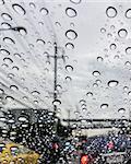 Rain drop  on the car glass between traffic jam.