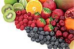 Healthy mixed fresh ruit selection high in antioxidants, vitamin c and dietary fiber, with copy space.