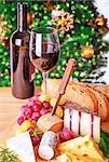 Christmas eve dinner, fine dining restaurant, romantic cheese and wine table setting, winter holidays celebration