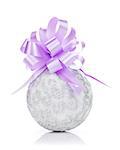 Christmas bauble and purple ribbon. Isolated on white background