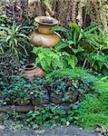 Twin pottery vase in the small garden.