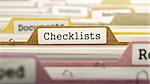 Checklists - Folder Register Name in Directory. Colored, Blurred Image. Closeup View.