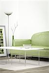3d interior render image of a green sofa in a white room with space for your content