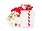 Christmas gift box and snowman toy. Isolated on white background