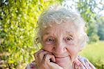 Close up of smiling senior woman outdoors