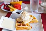 warm delicious waffles with fruits for breakfast