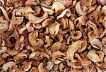 A lot of dried fruit. Dried slices apples background.