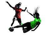 two women playing soccer players in silhouette isolated on white background