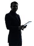 one  business man holding digital tablet posing portrait on white background