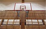 Old basketball hoop in an old gymnasium