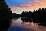 Romantic sunset. River Pongoma. North Karelia, Russia