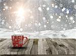 3D render of a Christmas mug on a wooden table with a snowy scene in the background