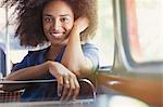 Portrait smiling woman riding bus