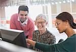 Business people working at computer in office