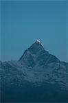 Snow capped mountain in darkness, Nepal