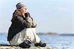 Woman relaxing at sea