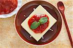 Brazilian dessert Romeo and Juliet, goiabada jam and cheese on wooden table. Selective focus