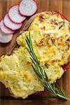 French toast ham cheese and salad on wooden table