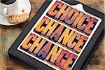 choice, chance and change word abstract  - 3 Cs in life concept  - text in letterpress wood type printing blocks on a digital tablet with a cup of coffee