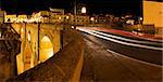 Illuminated  bridge from old town of Ronda, Spain. Panoramic night scene