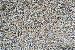 Close up of small rough gravel background texture