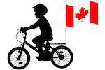 A kid silhouette rides a bicycle with Australia flag