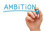 Hand writing Ambition with blue marker on transparent wipe board isolated on white.