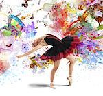 Classical dancer posing between splashes of color