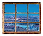 Fort Collins, Colorado, cityscape at night - abstract view from a sash window of old  mountain cabin