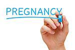 Hand writing Pregnancy with blue marker on transparent wipe board isolated on white background.