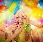 Girl laugh and playing with colored powders