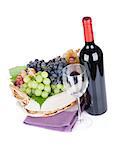 Red wine bottle and grapes. Isolated on white background