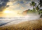 Morning fog over sandy beach of the ocean