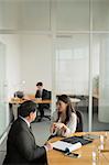 Singapore, Businesswoman having discussion with senior colleague in office