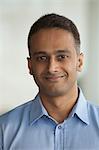 Singapore, Portrait of businessman smiling