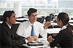 India, Group discussion with two men and one woman